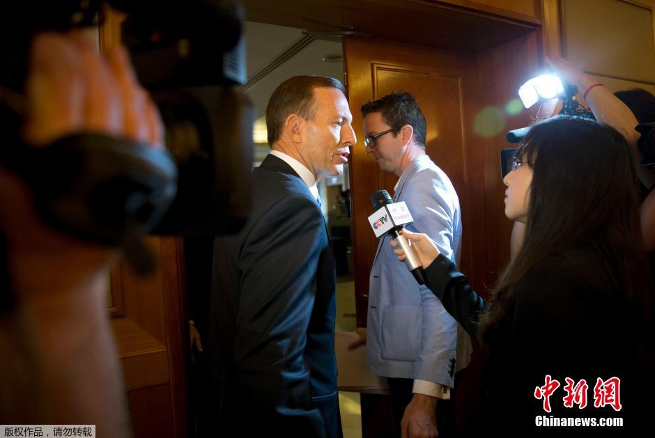 澳總理北京召開記者會 確認信號來自于MH370 澳總理北京召開記者會 確認信號來自于MH370