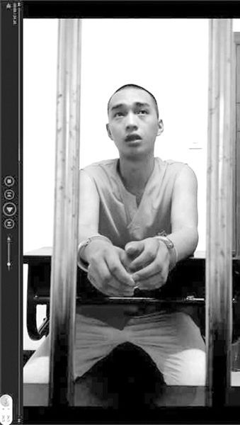 在看守所里的陳明燦。視頻截圖